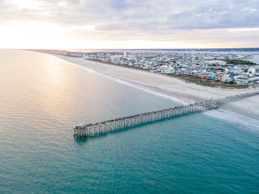 Aerial view of the Oceanana Pier in Atlantic Beach on the Crystal Coast of North Carolina at sunset.