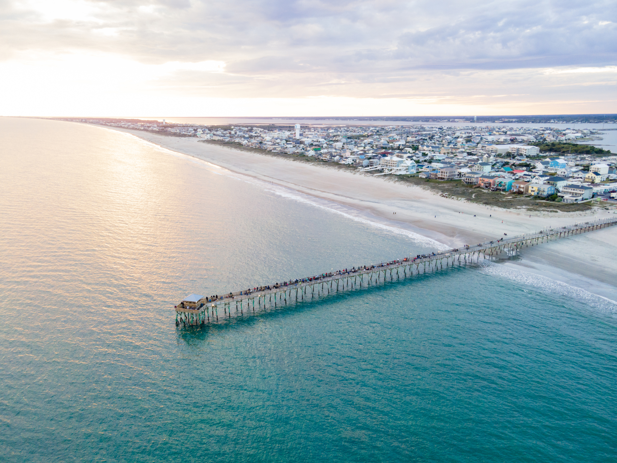 Aerial view of the Oceanana Pier in Atlantic Beach on the Crystal Coast of North Carolina at sunset.