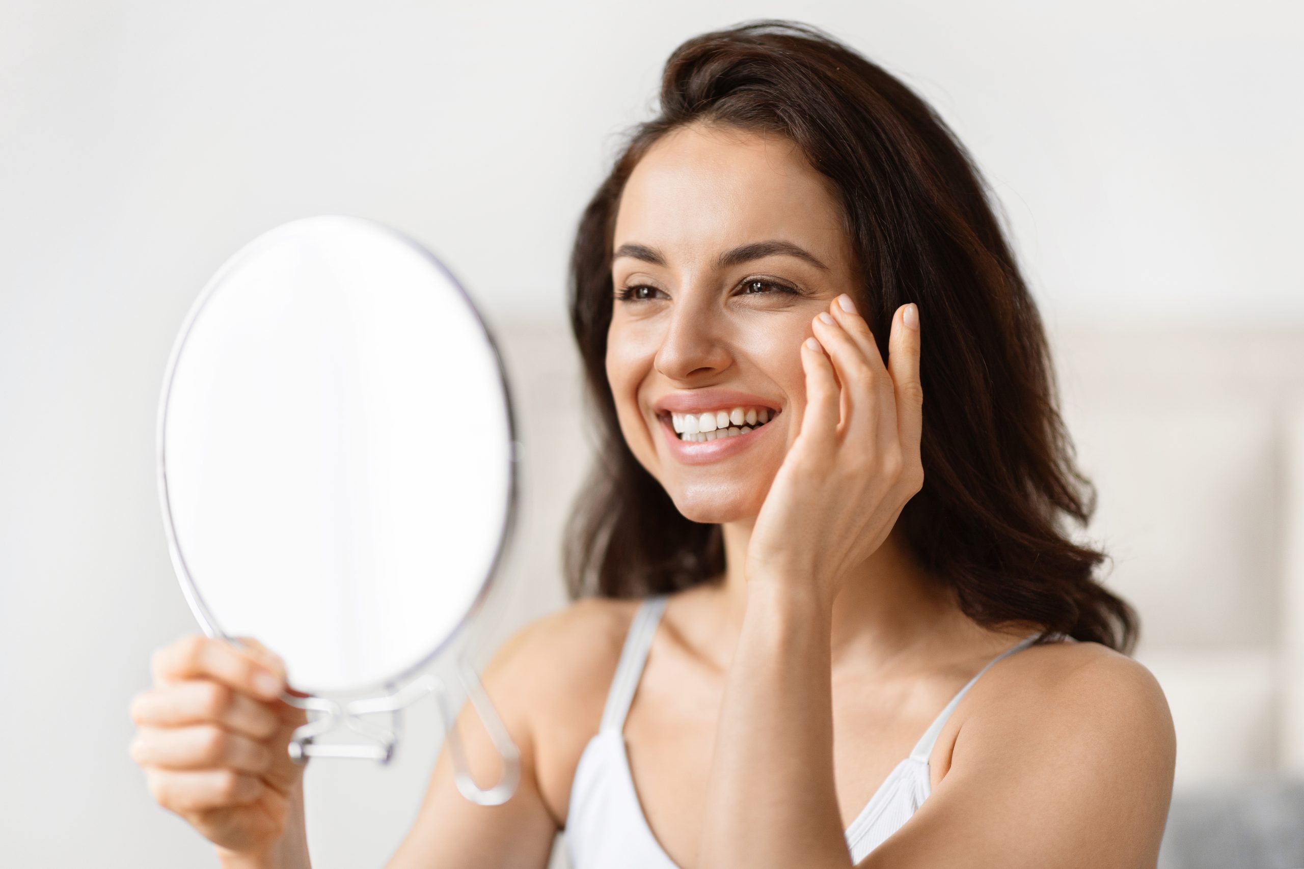 Analytical,Millennial,Woman,Focused,On,Skincare,,Closely,Examining,Her,Eyes